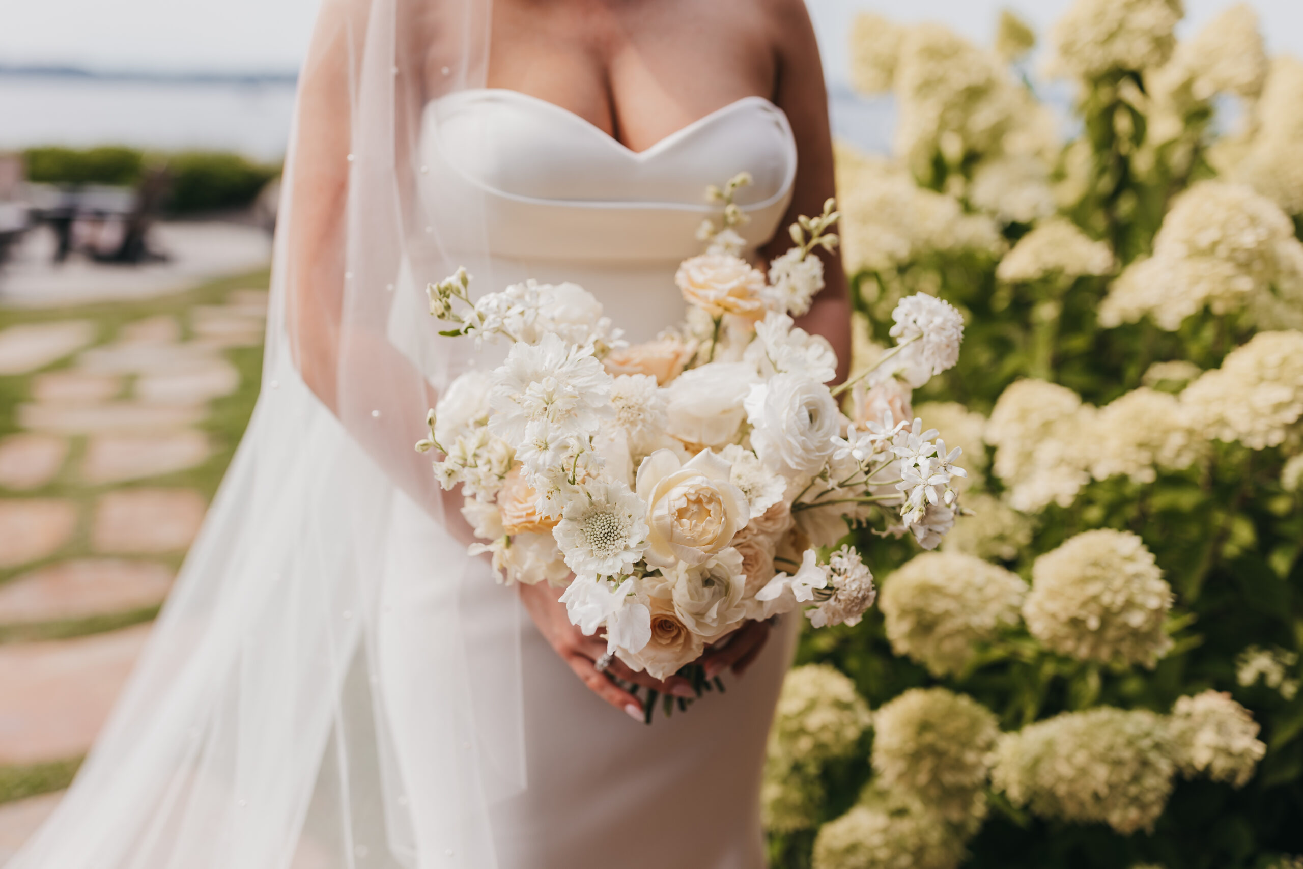 bride white florals chic classic lakeside tented wedding